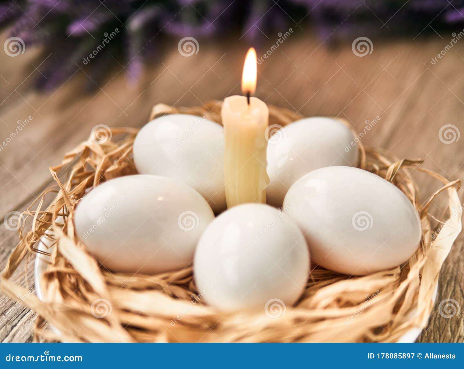 White Easter Eggs with Lighting Candle. Happy Easter Concept Stock