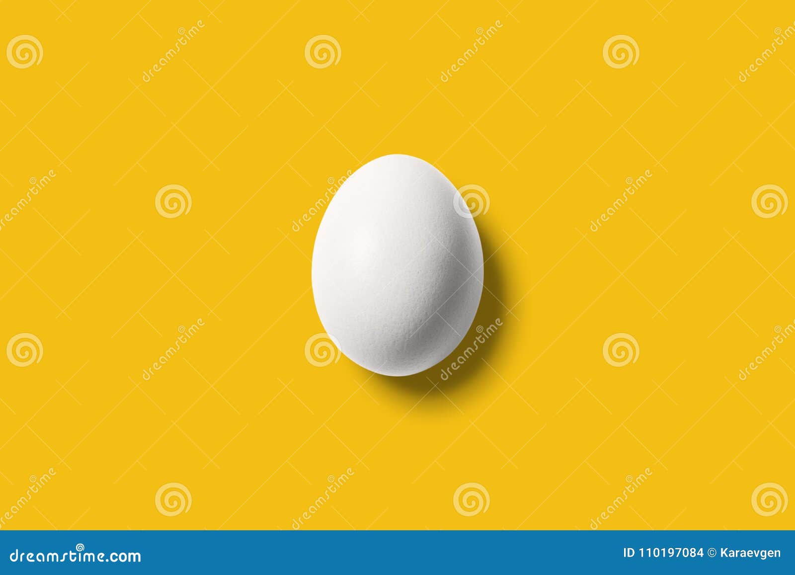 White Egg on Bright Yellow Background. Stock Photo Image of healthy
