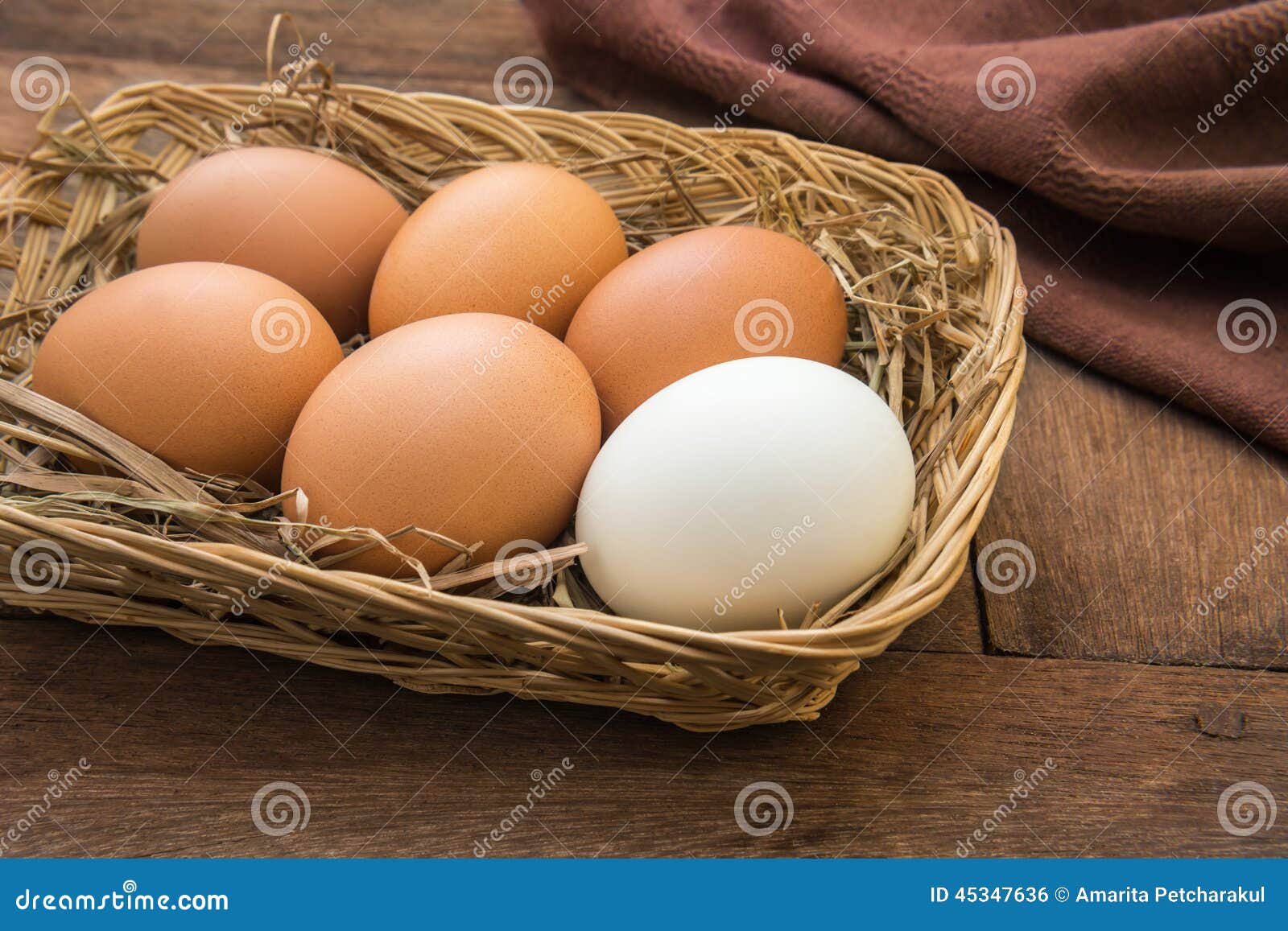 White Egg and Brown Eggs in Basket Stock Photo Image of fresh, healthy 45347636