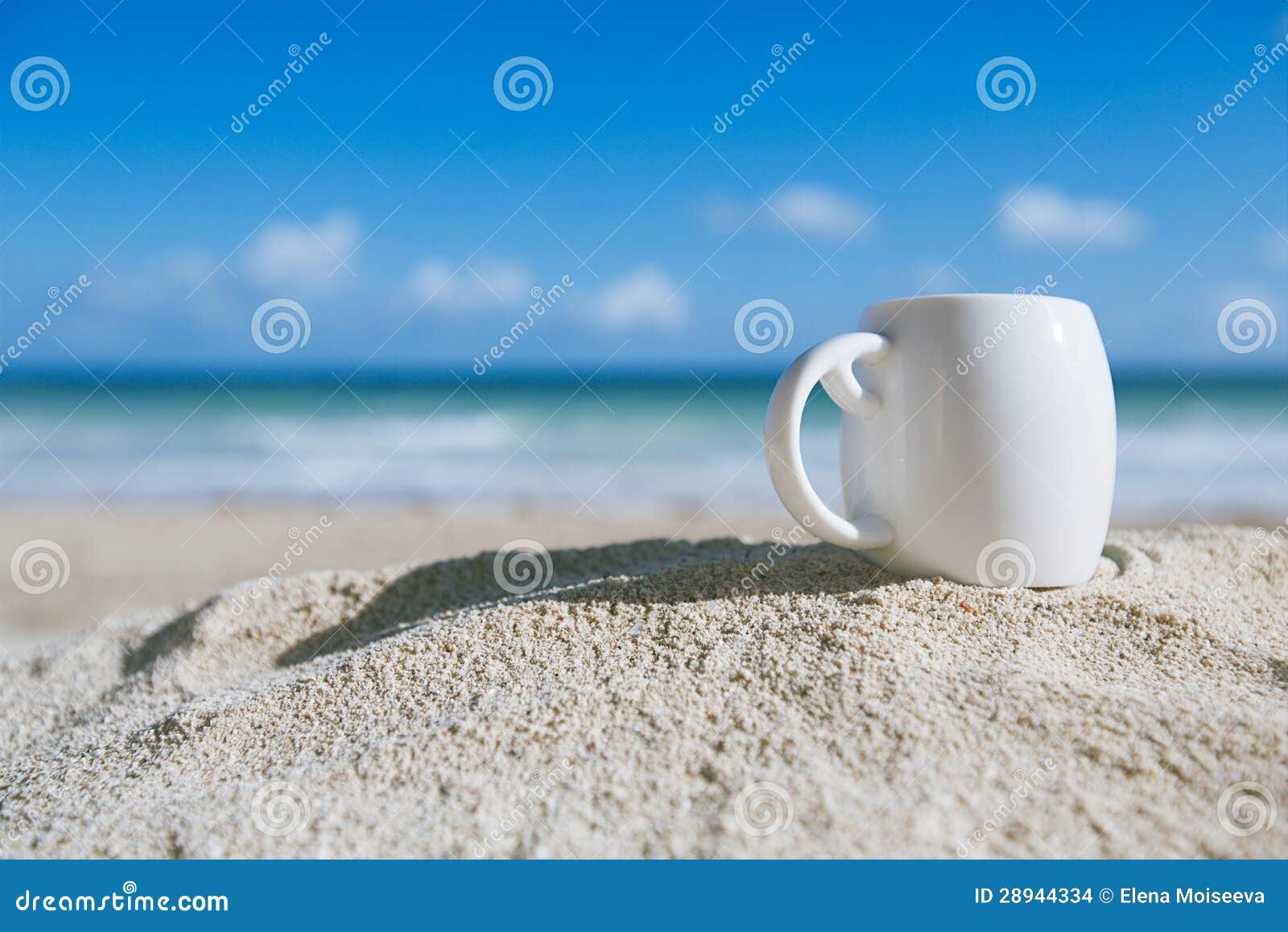 White Espresso Coffee Cup with Ocean , Beach and Seascape Stock Photo