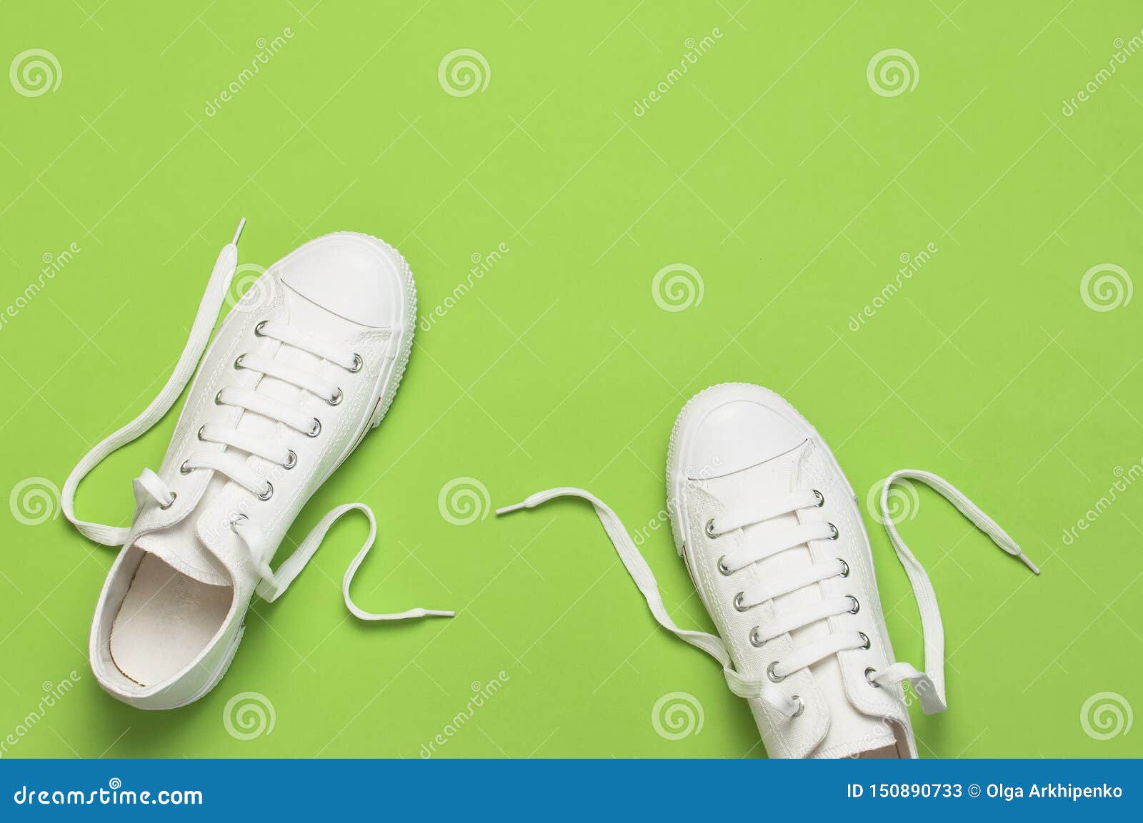 White Female Fashion Sneakers on Green Background. Flat Lay Top View ...