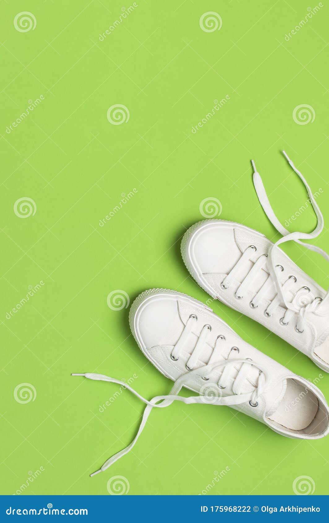 White Female Fashion Sneakers on Green Background. Flat Lay Top View ...