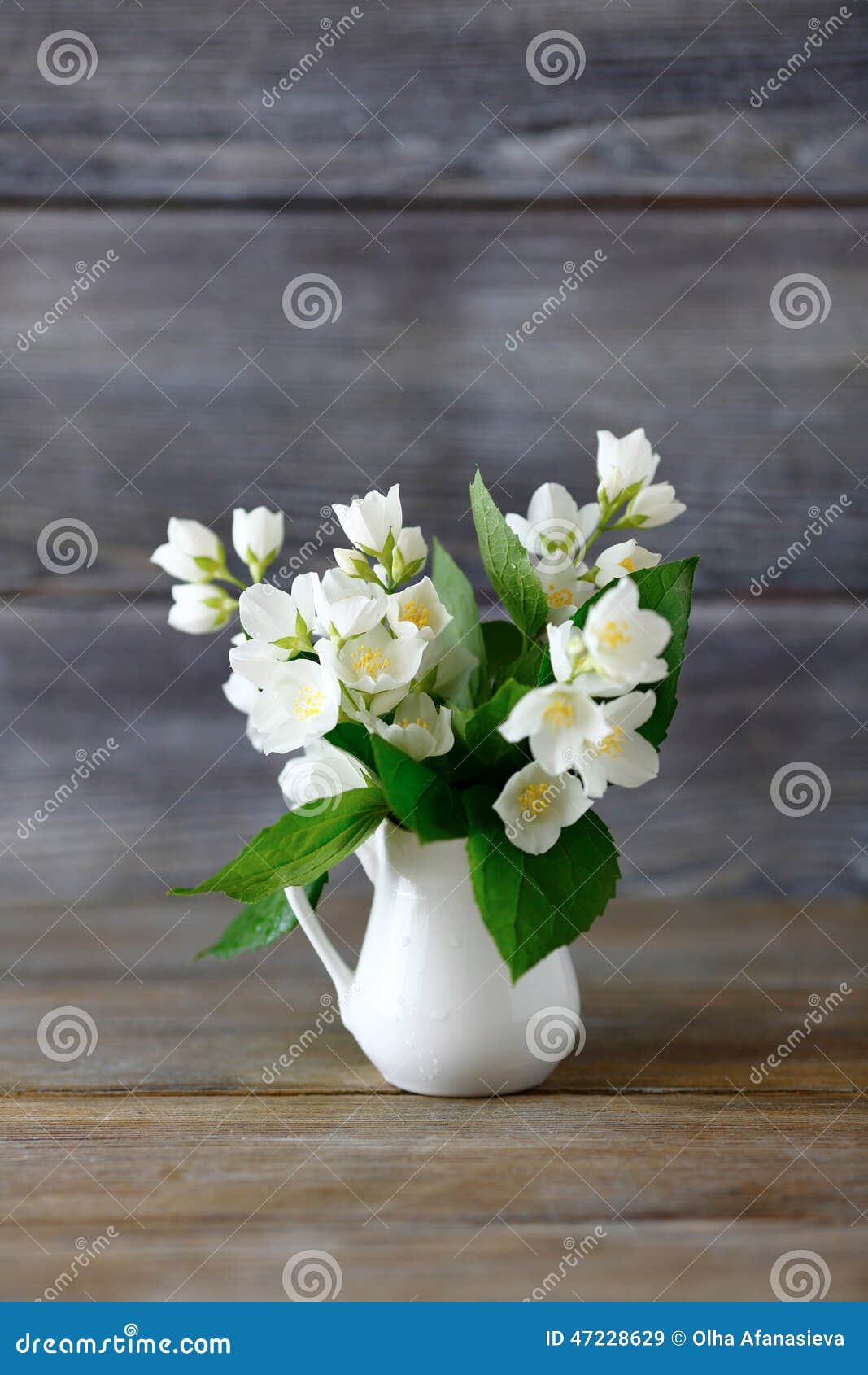 White Flowers in a Vase on Wooden Surface Stock Image Image of jasmin