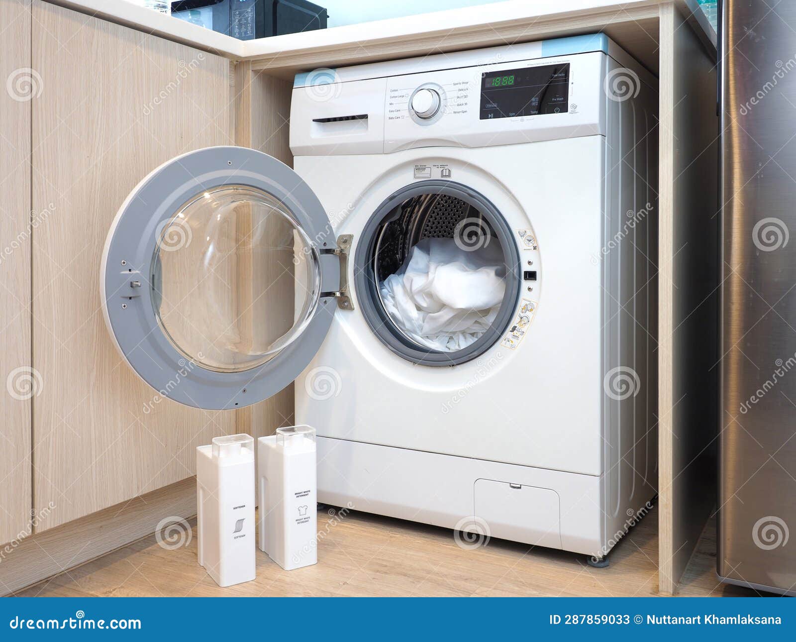 White Front Load Washing Machine at Small Kitchen Stock Image Image