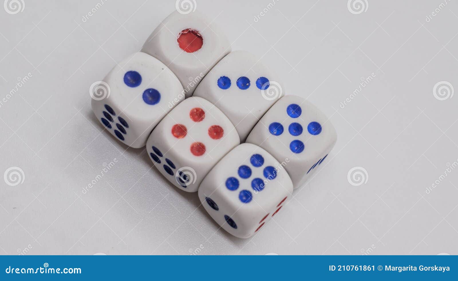 white game cubics with blue and red spikes dots on a white background. game, gambling, chance and risk concept