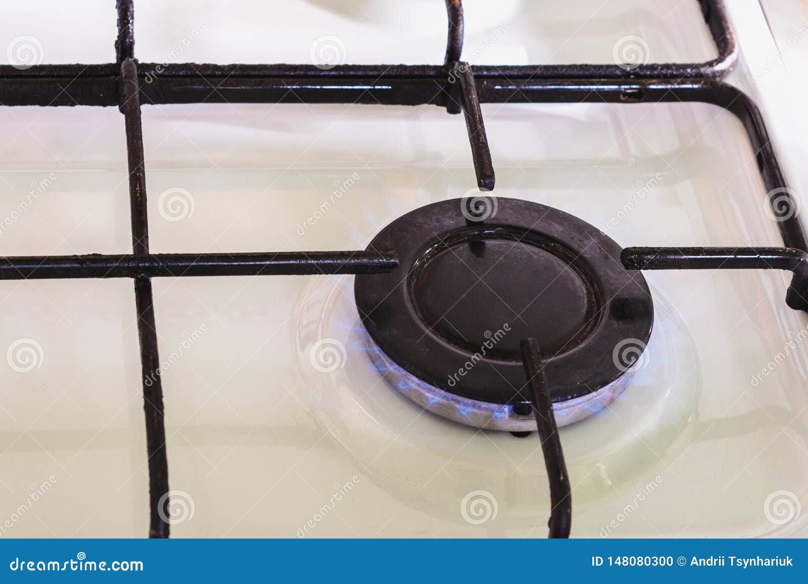 On the White Gas Stove the Burner is Lit from Which the Flame of
