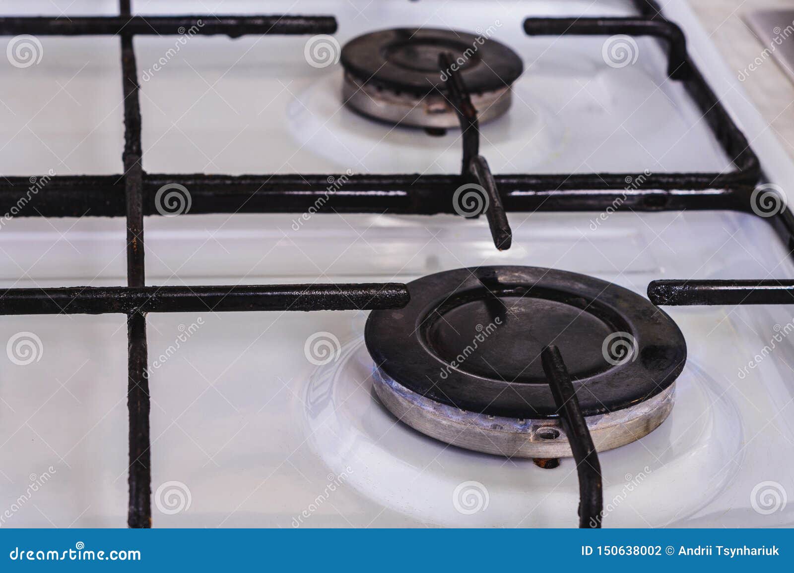 On the White Gas Stove the Burner is Lit from Which the Flame of