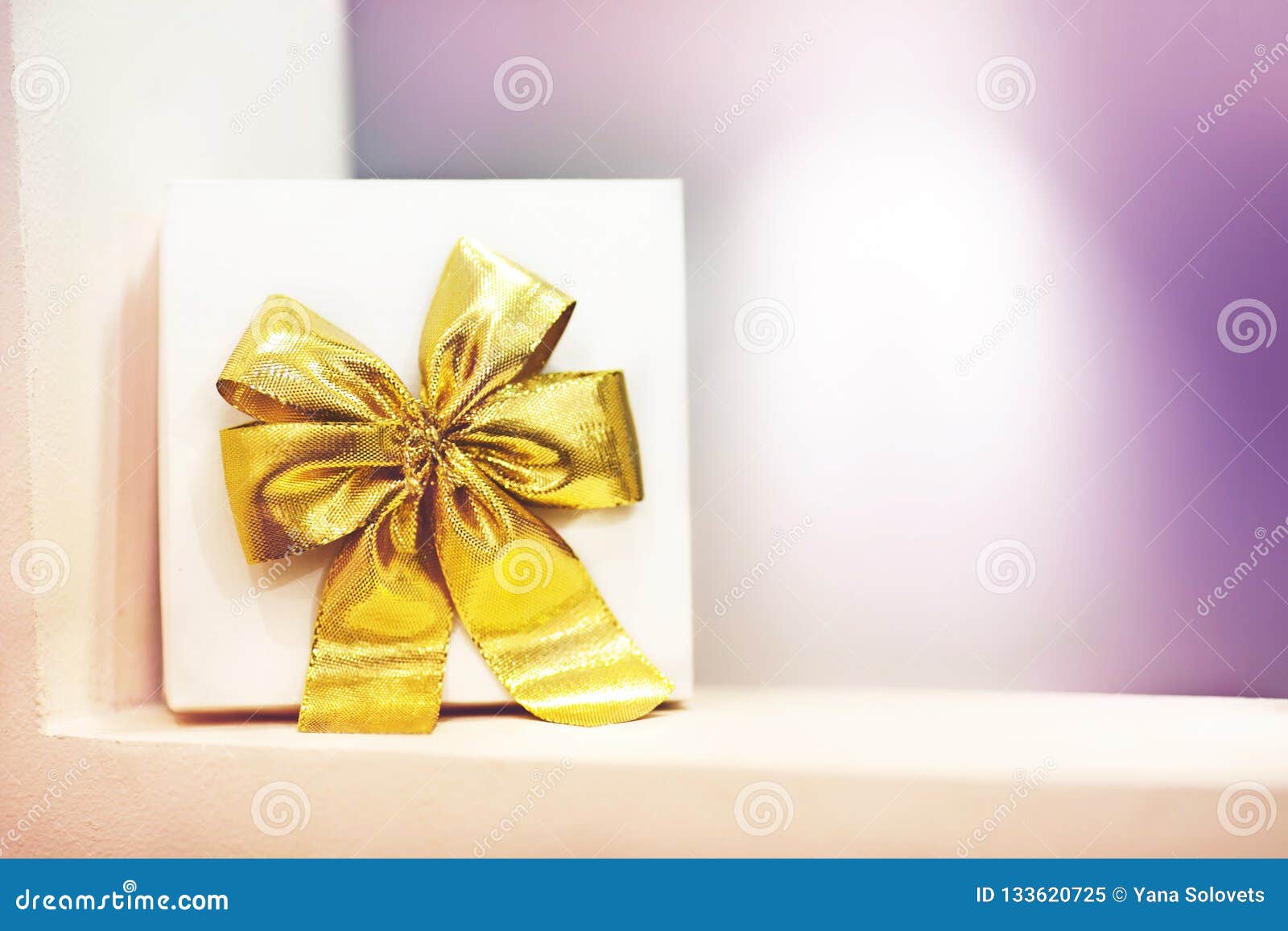 Download Gift Box With A Yellow Bow On A Purple Background Stock Image Image Of Luxury Gadget 133620725 Yellowimages Mockups