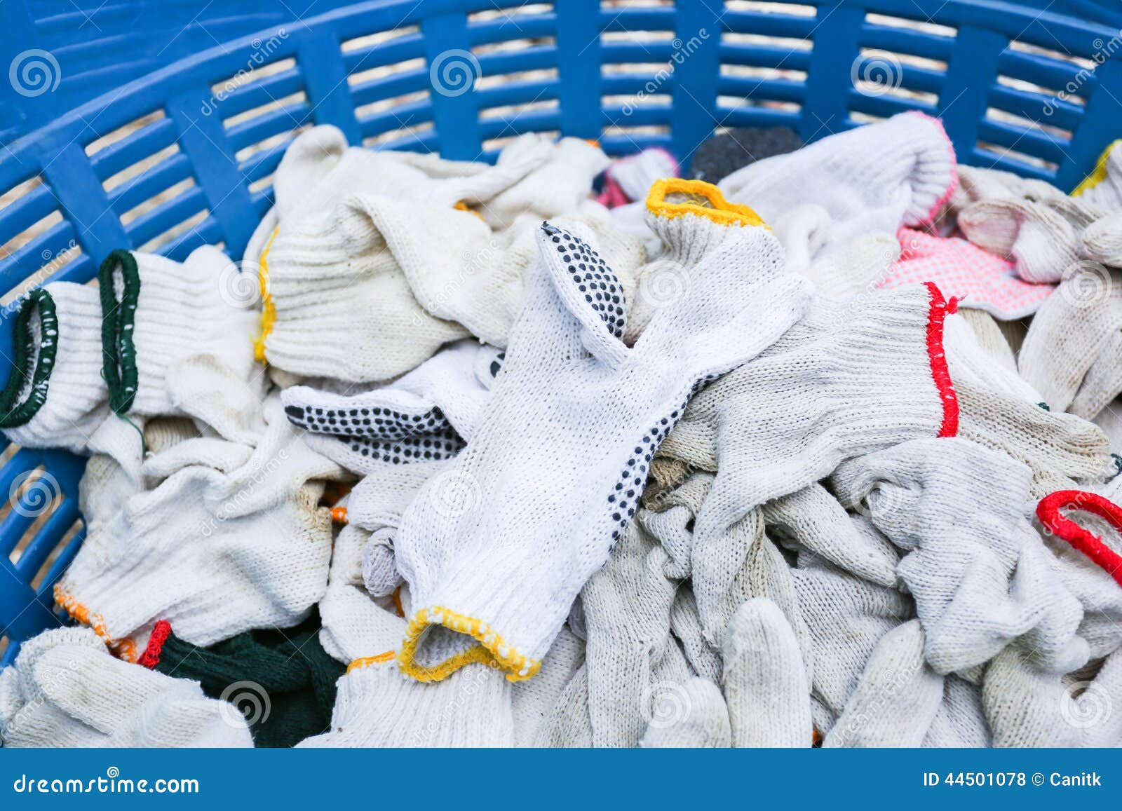 White gloves in basket stock photo. Image of protective 44501078