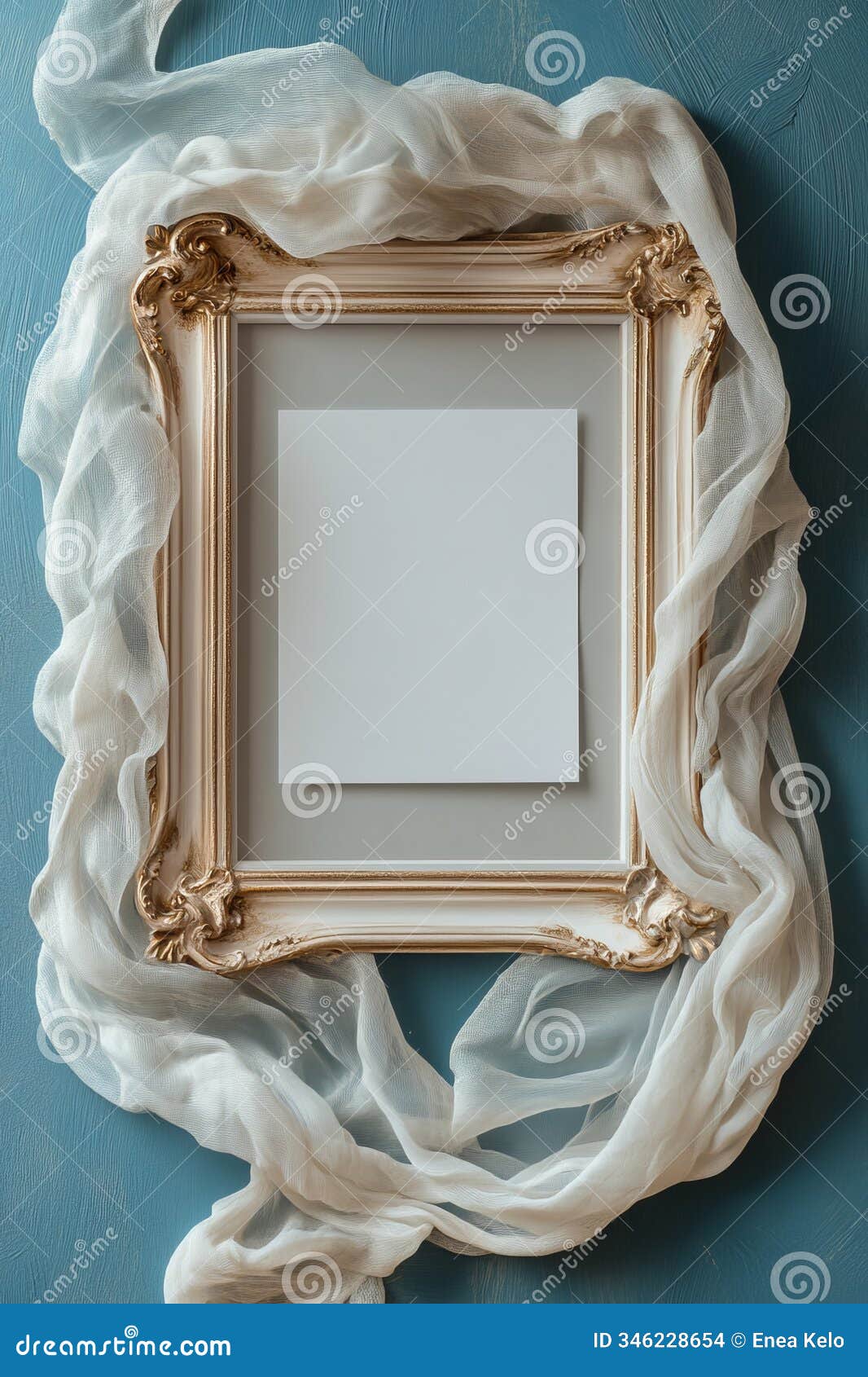 white and gold vintage frame on neutral textured fabric