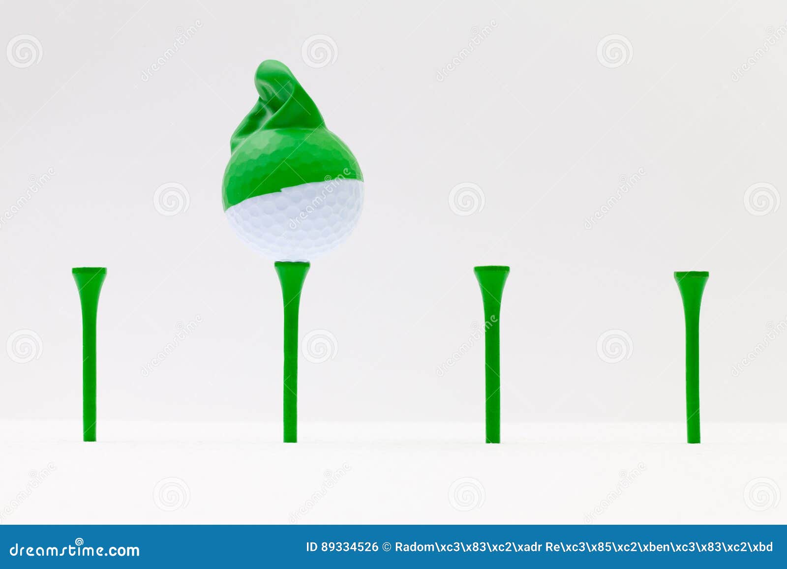 White Golf Balls with Funny Cap. Funny Golf Concept. Stock Photo Image of equipment, gnome