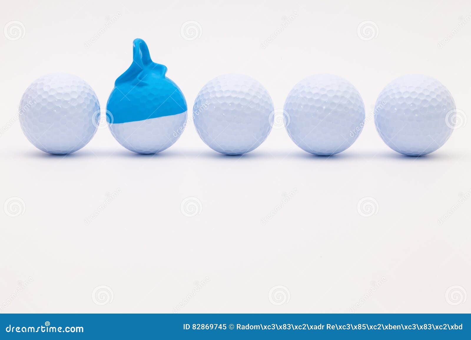 White Golf Balls with Funny Cap on the White Background. Stock Image Image of blank, sight