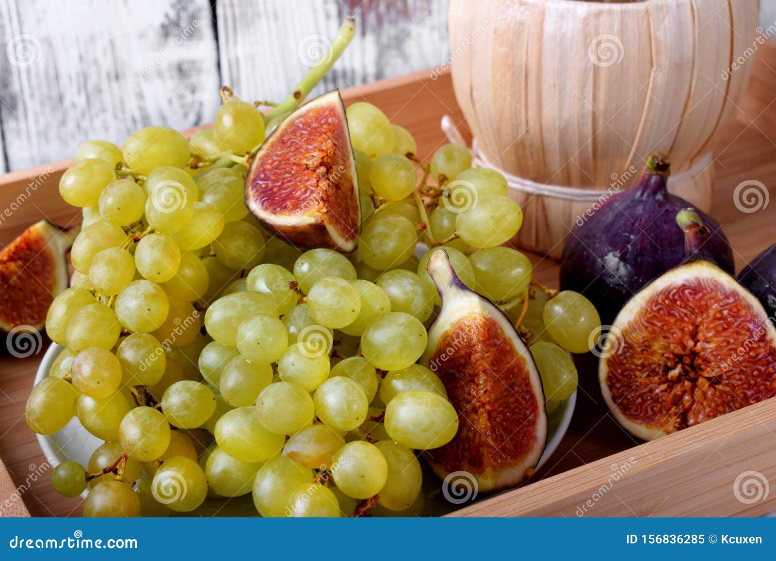 White Grapes, Figs and Italian Spirit Grappa on Wooden Tray Stock Image ...