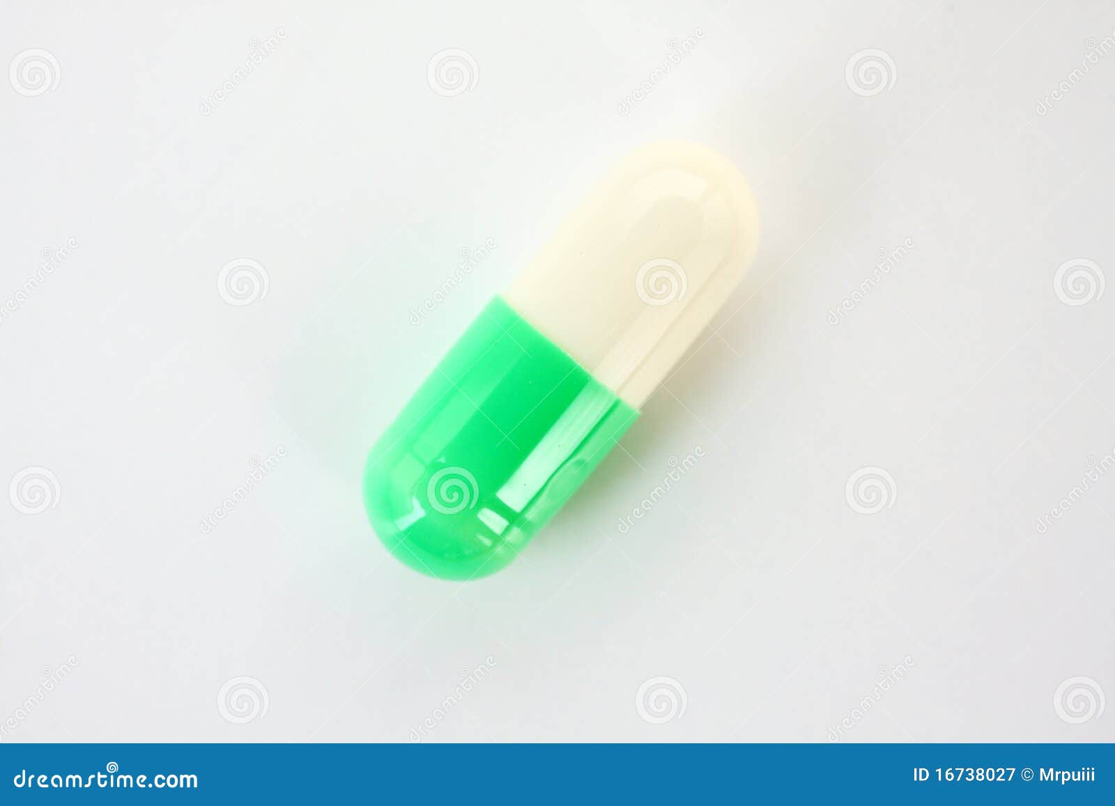 White Green Capsule. Royalty Free Stock Photography Image 16738027