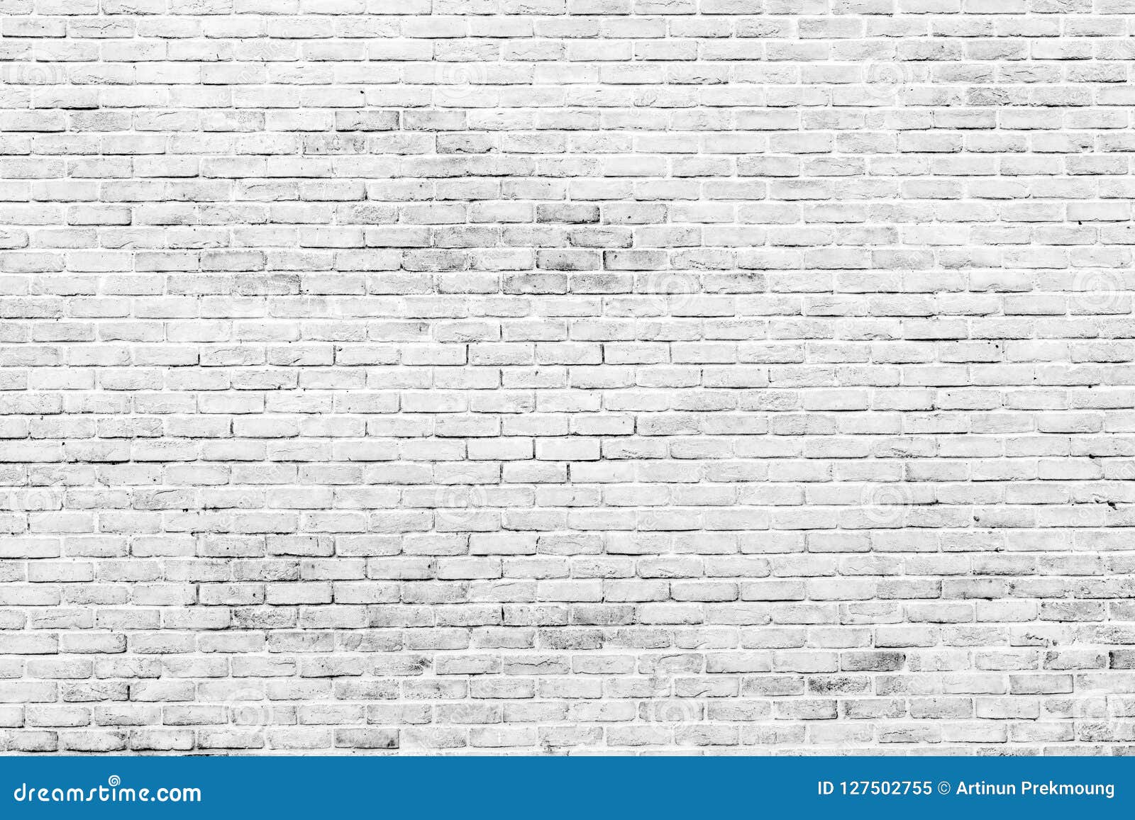 white and grey brick wall texture background with space for text. white bricks wallpaper. home interior decoration. architecture