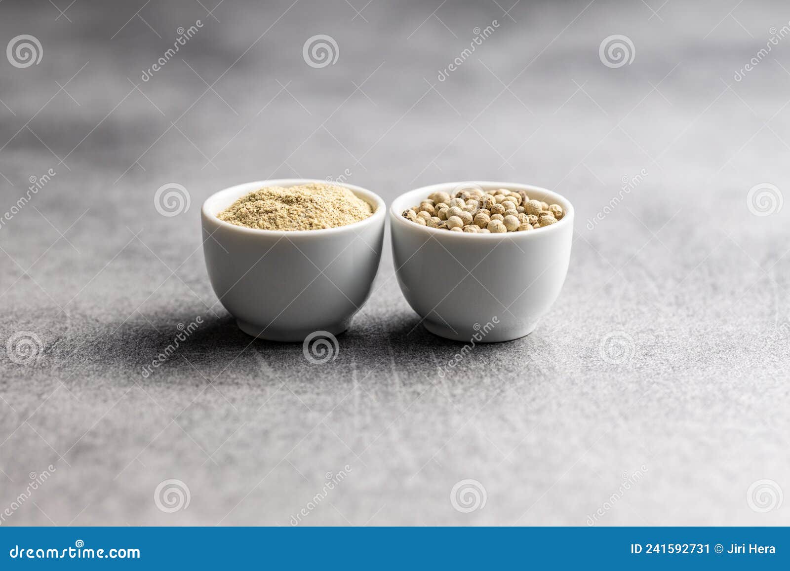 White Ground Pepper and Whole Peppercorn Spice in Bowl Stock Image