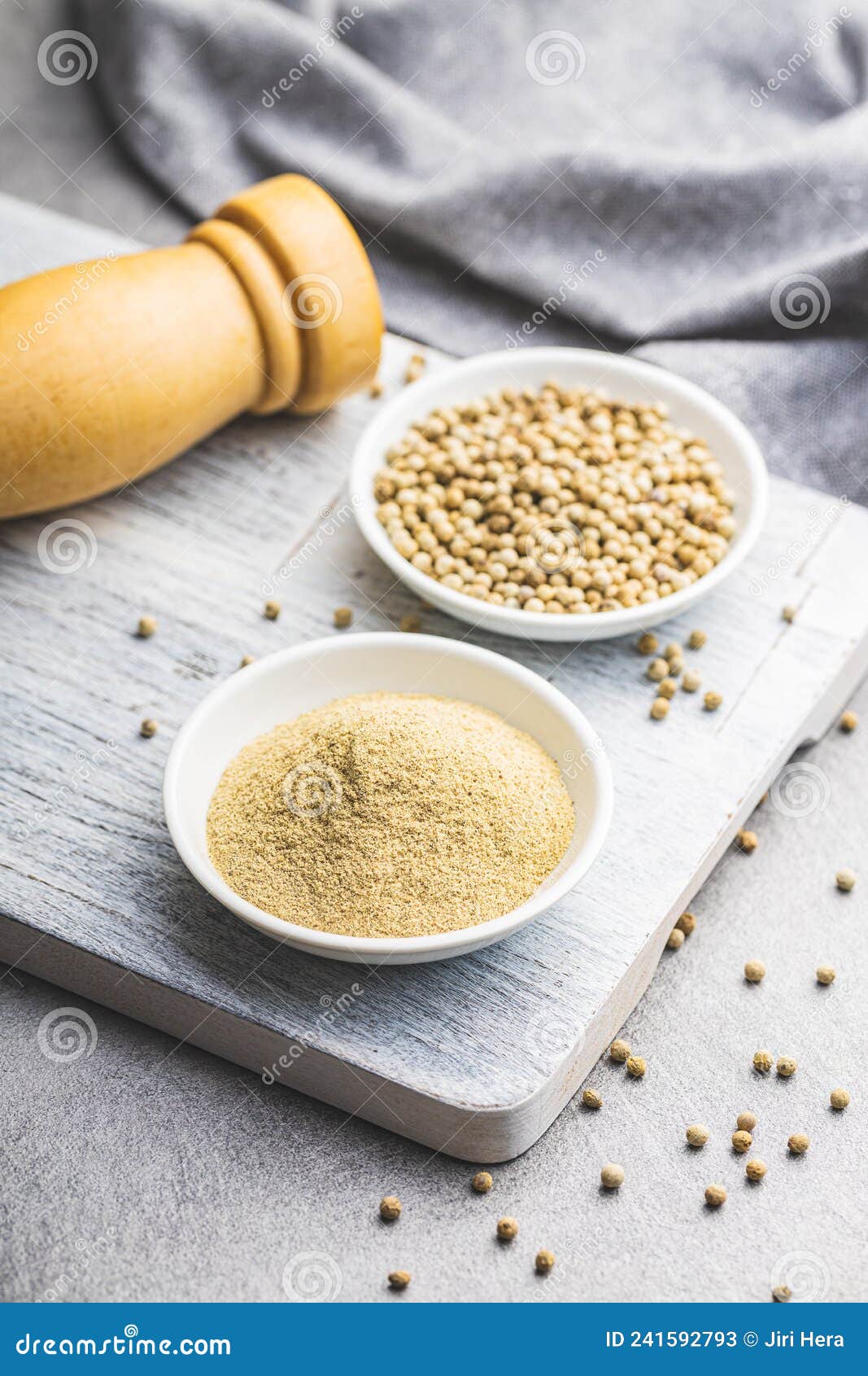 White Ground Pepper and Whole Peppercorn Spice in Bowl Stock Image
