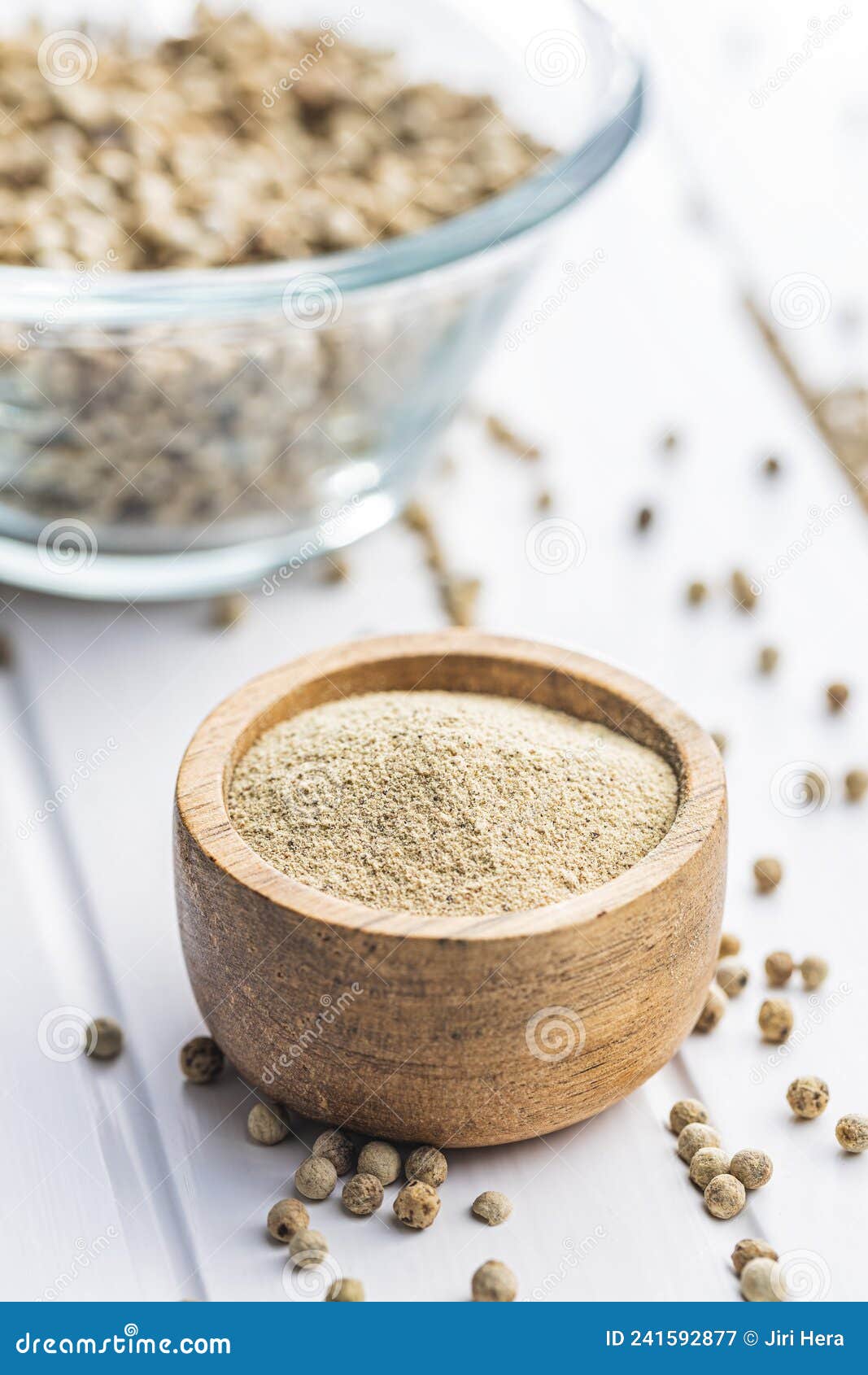 White Ground Pepper and Whole Peppercorn Spice in Bowl Stock Image