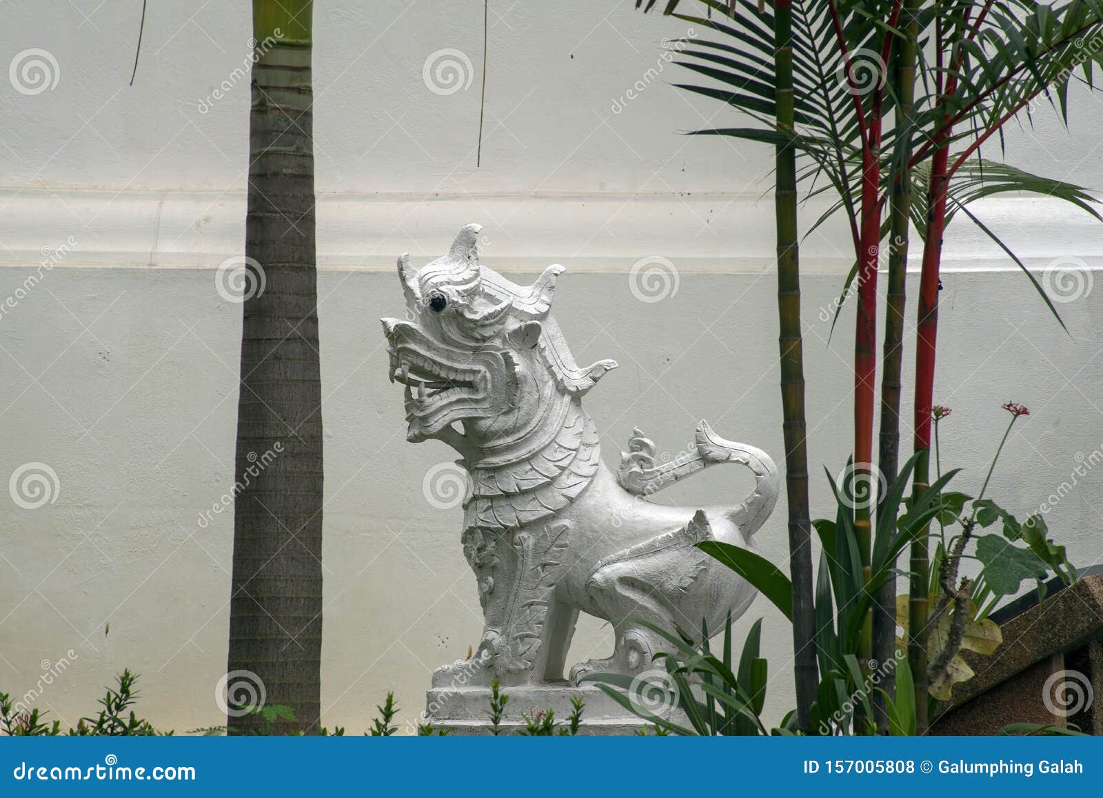 guardian sculpture in gardens at wat umong mahathera chan, chiang mai, thailand