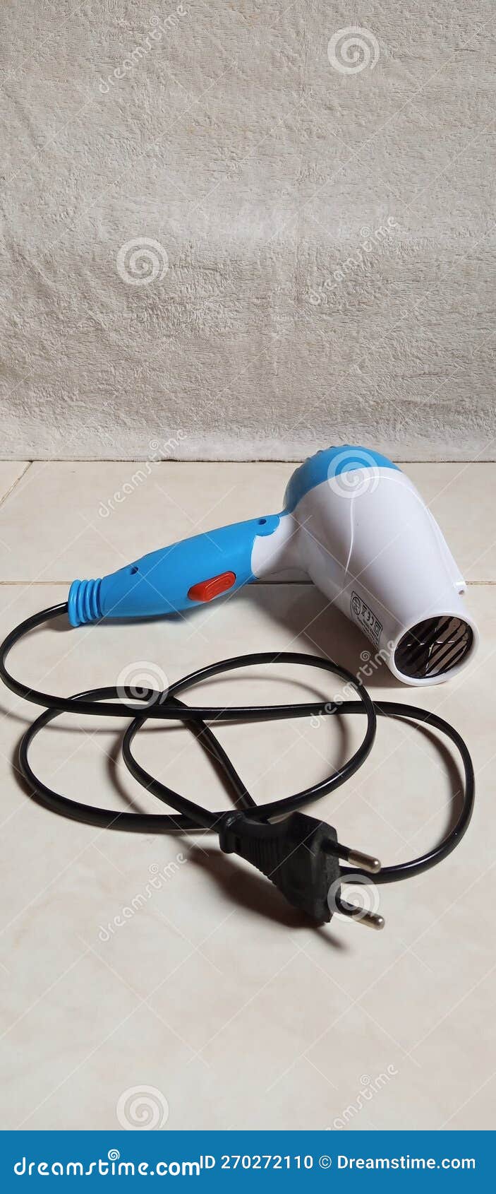 White Hair Dryer with Blue Handle and Cord Stock Photo Image of