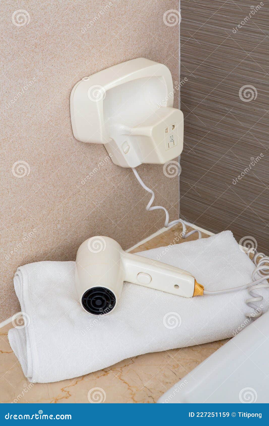 White Hair Dryer on the Towel in the Bathroom Stock Image Image of