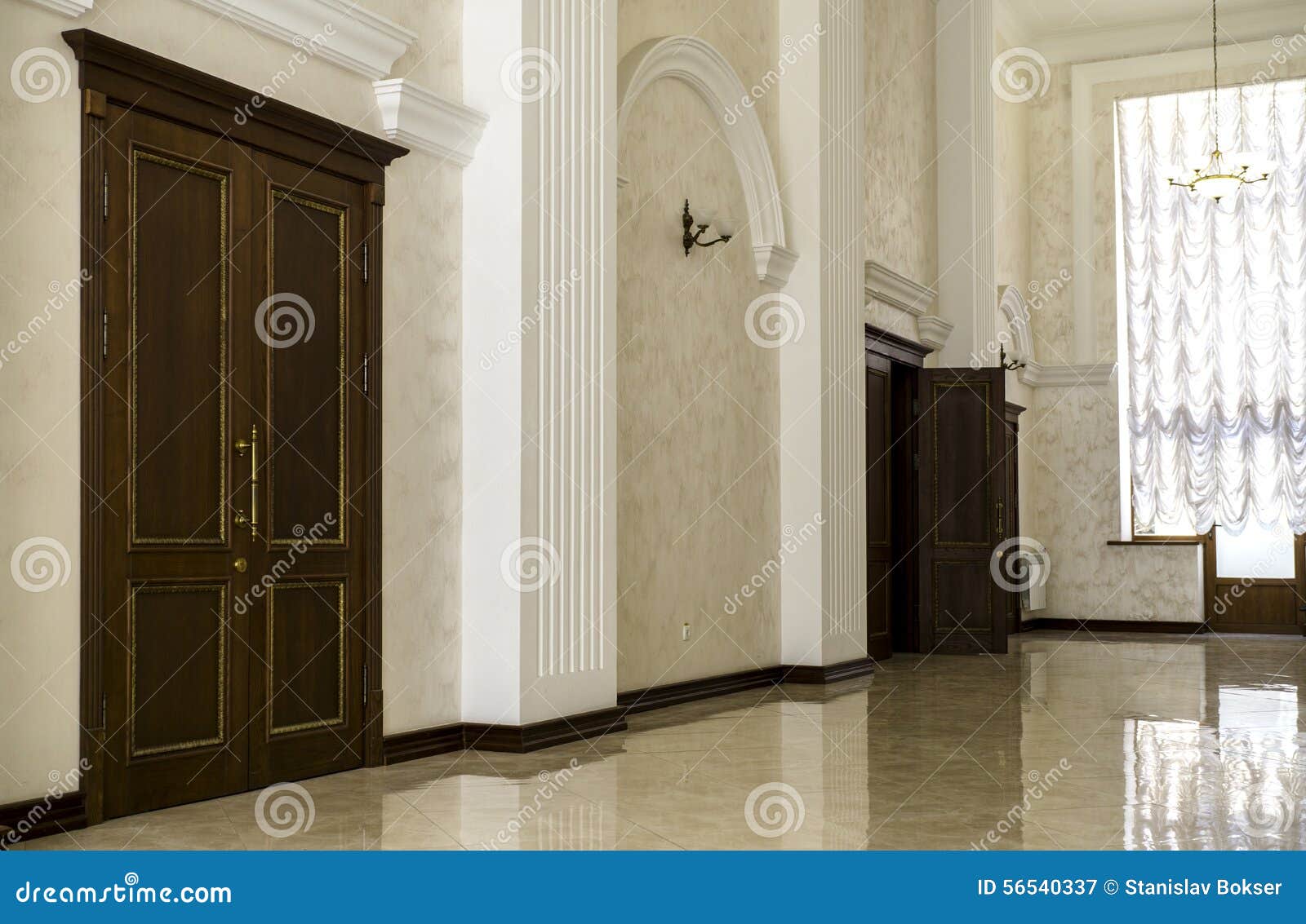White Hallway with Marble Floor, Brown Doors and Window Stock Image Image of corridor, door