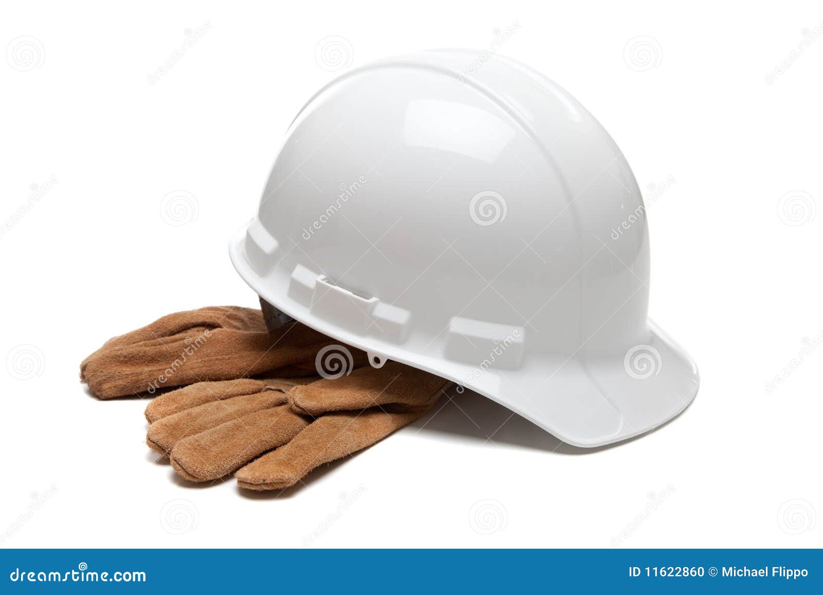 white hard hat and leather work gloves on white