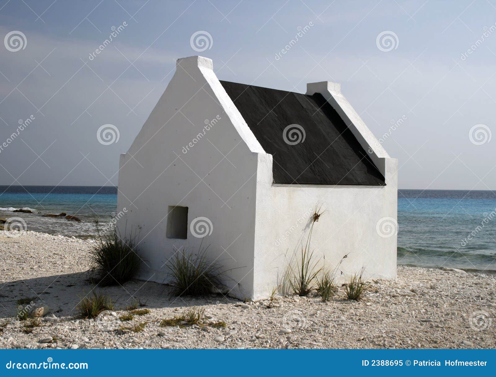 White house on the beach stock image. Image of travel 2388695