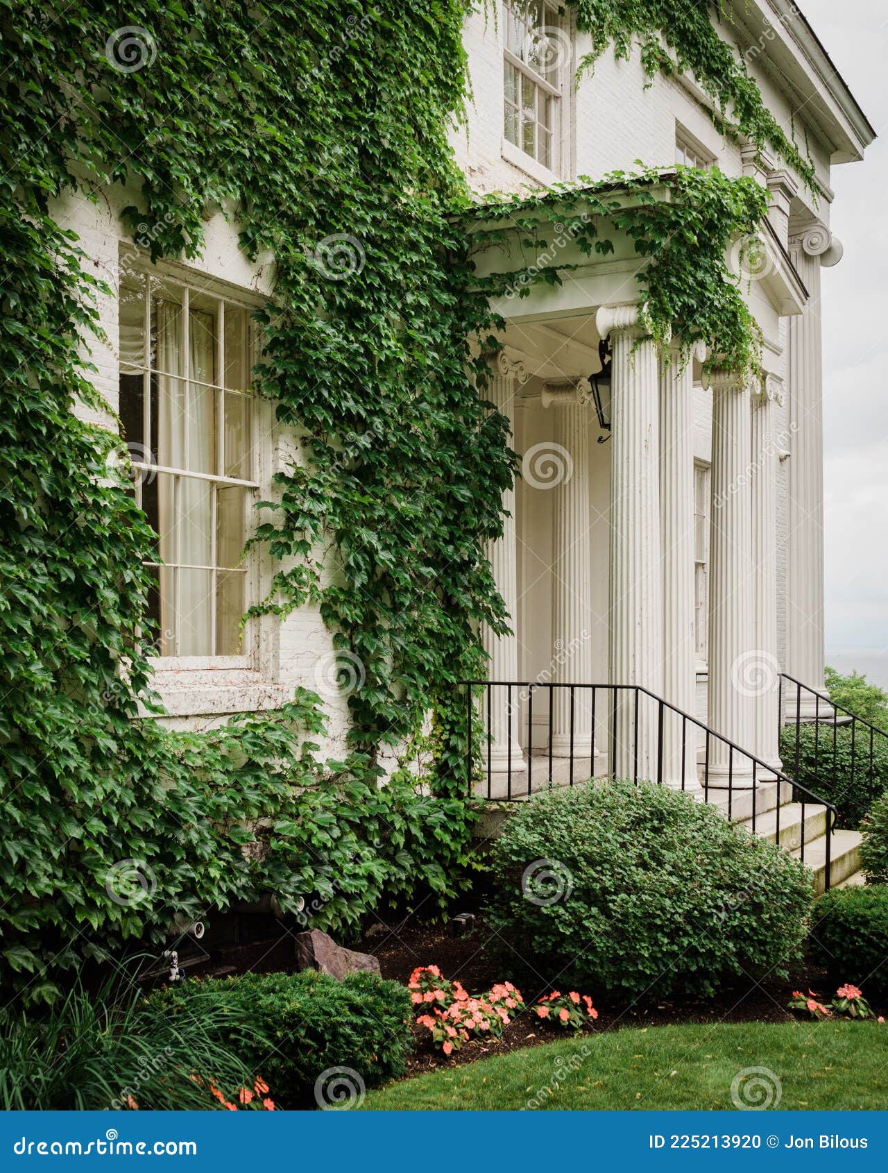 White House Covered in Ivy, in Burlington, Vermont Stock Photo Image