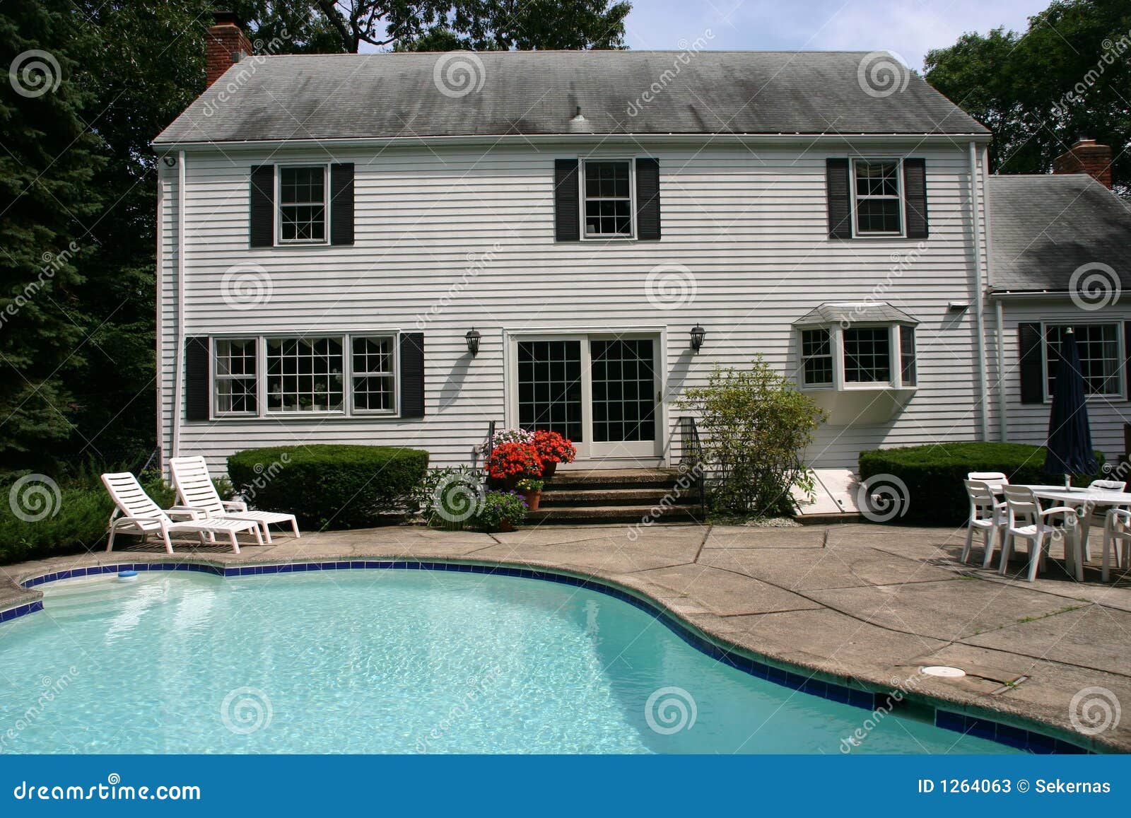 White house with pool stock image. Image of turqoise, door 1264063