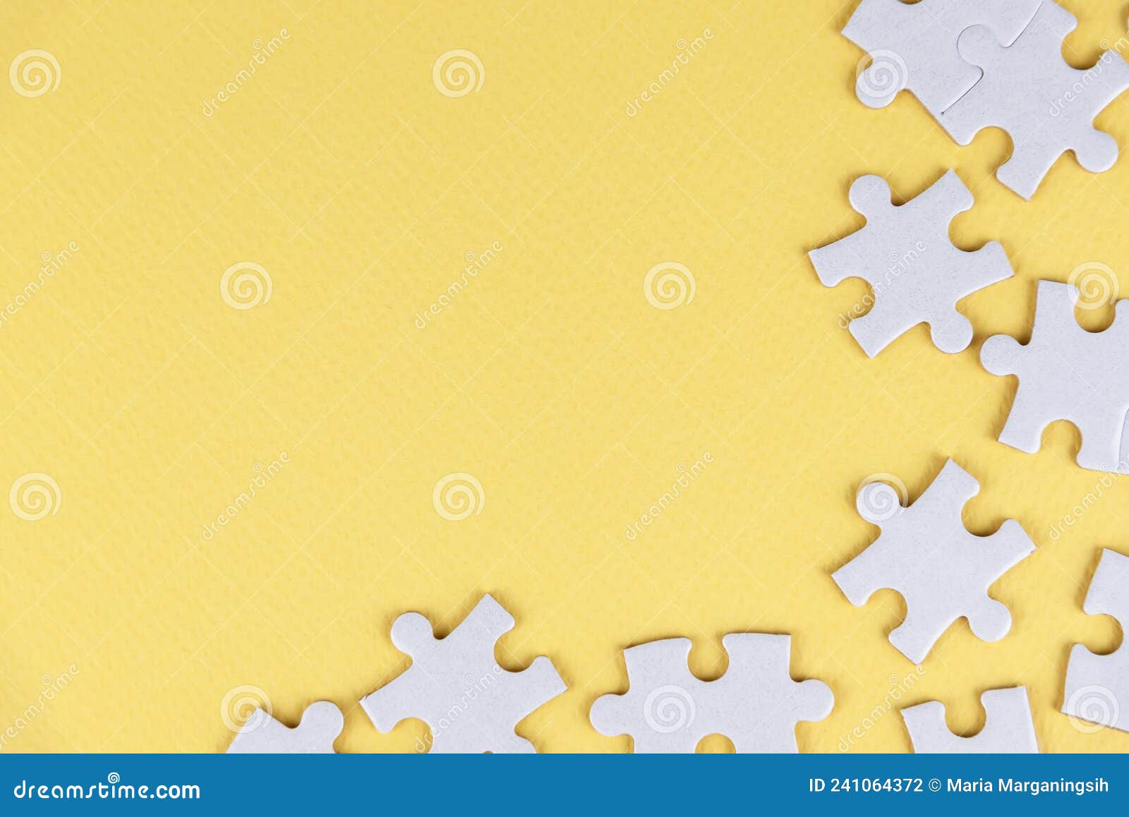 white jigsaw puzzle with some missing pieces on soft yellow background. blank missing puzzle piece for your creative text idea.