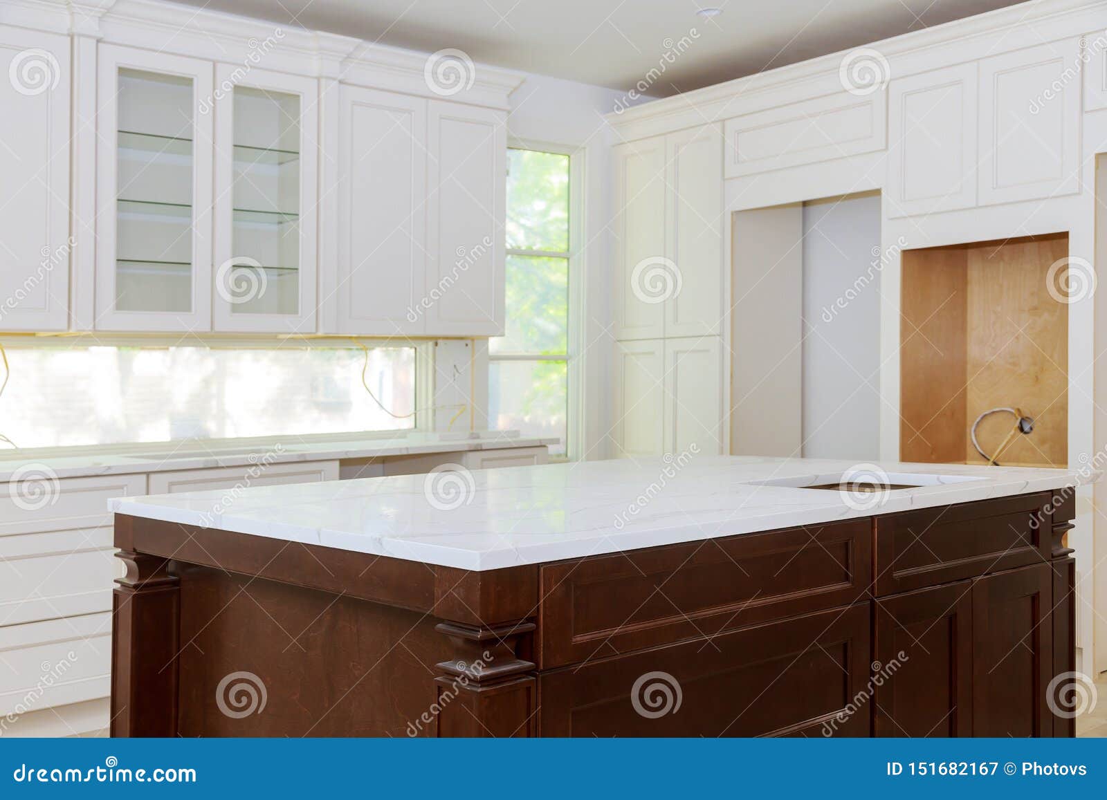 White Of Kitchen Wooden Cabinets With Contemporary Look Stock