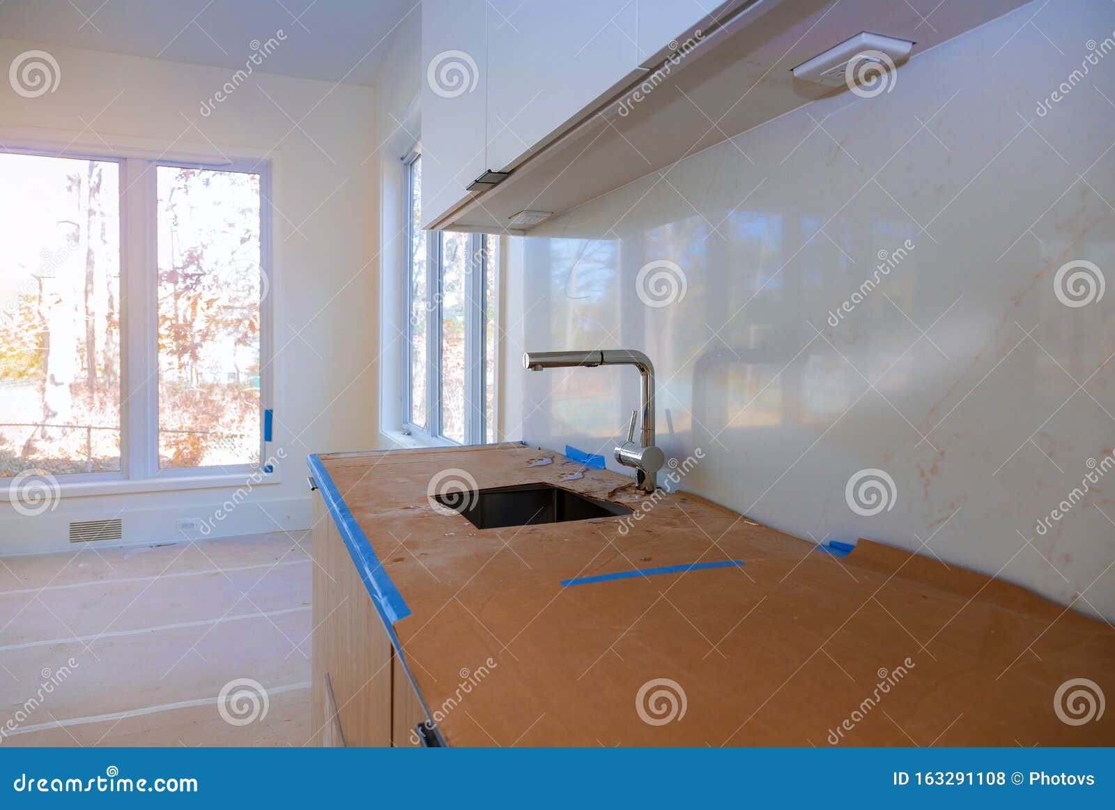White Of Kitchen Wooden Cabinets With Contemporary Stock Photo