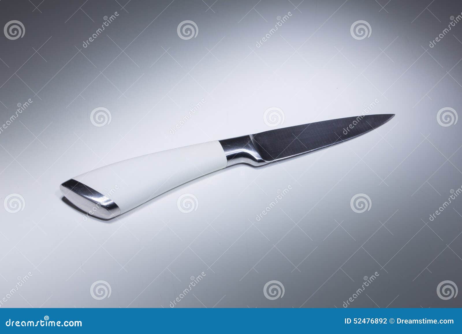 White knife on a table stock photo. Image of silverware 52476892