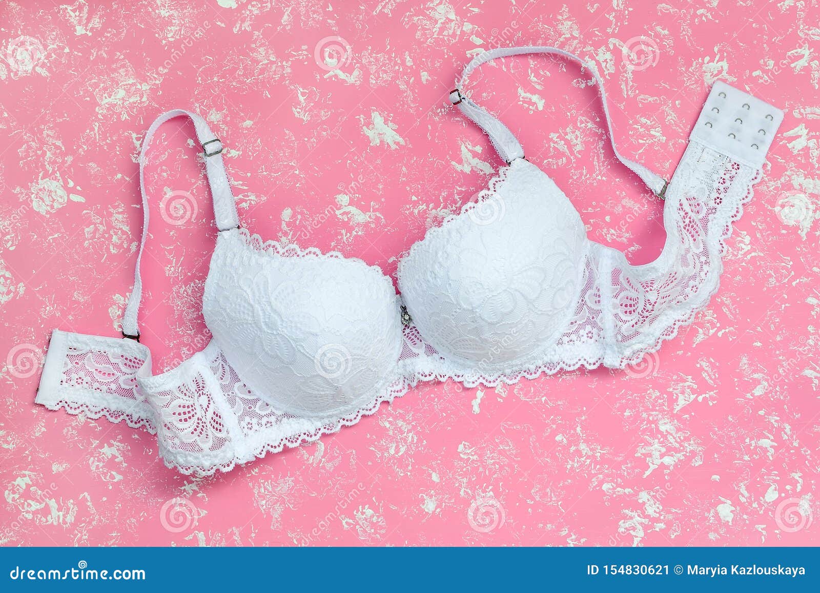 White Lacy Bra on a Pastel Pink Background with White Spots. Comfortable  Modern Lingerie and Woman Health Stock Image - Image of bust, health:  154830621