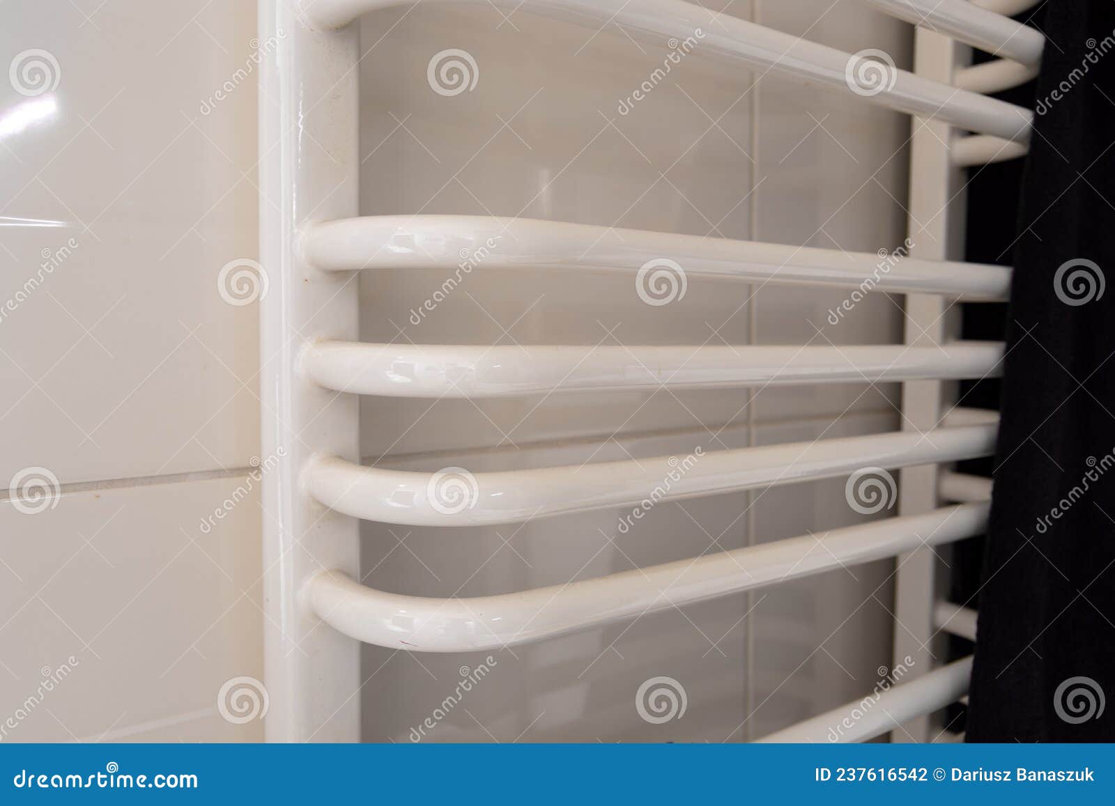 White Ladder Bathroom Radiator and Dark Towel Stock Photo Image of