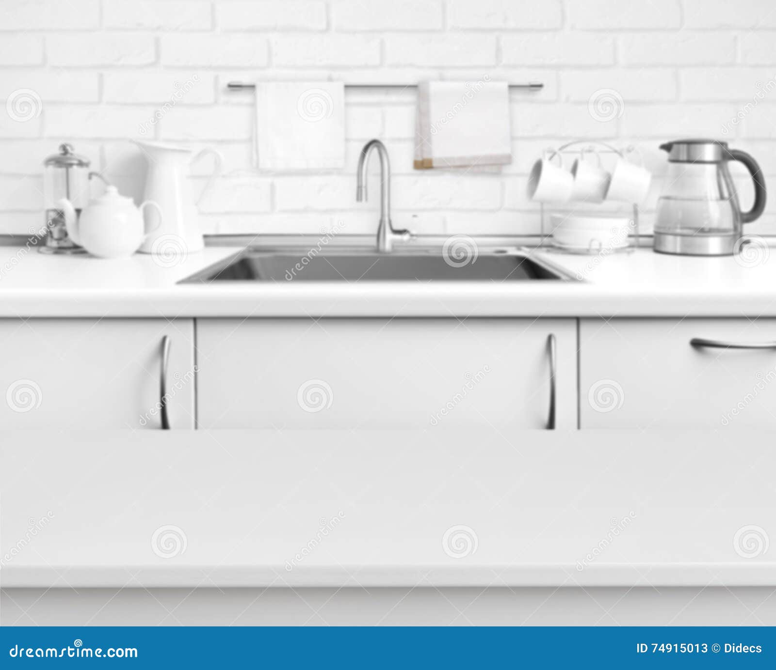White Laminated Table On Blurred Rustic Kitchen Sink Interior