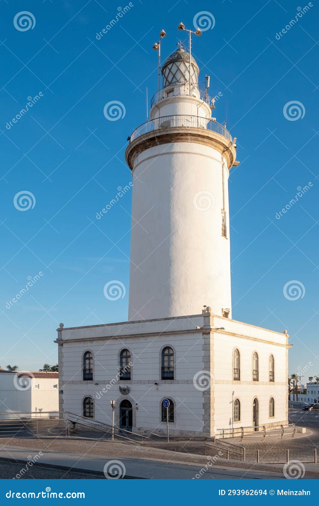 white lighthouse building (la farola). malaga, costa del sol, andalusia, spain