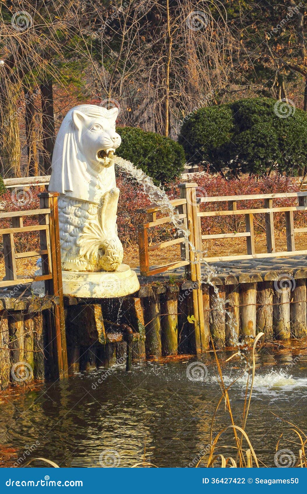 White Lion Statues Spewing Water. Stock Photo Image of stone, statue 36427422