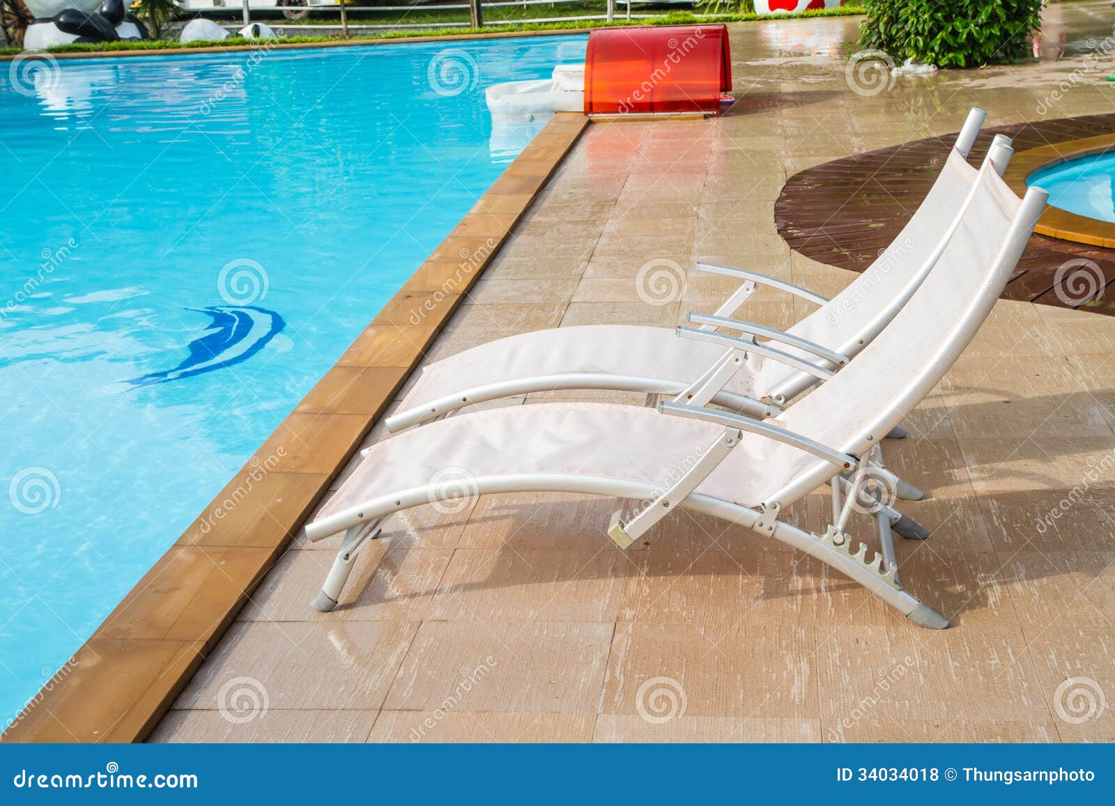 White Lounges Next To a Swimming Pool Stock Photo Image of patio