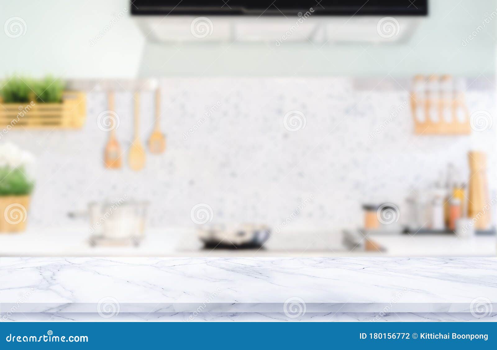 white marble texture  table top on blurred kitchen background