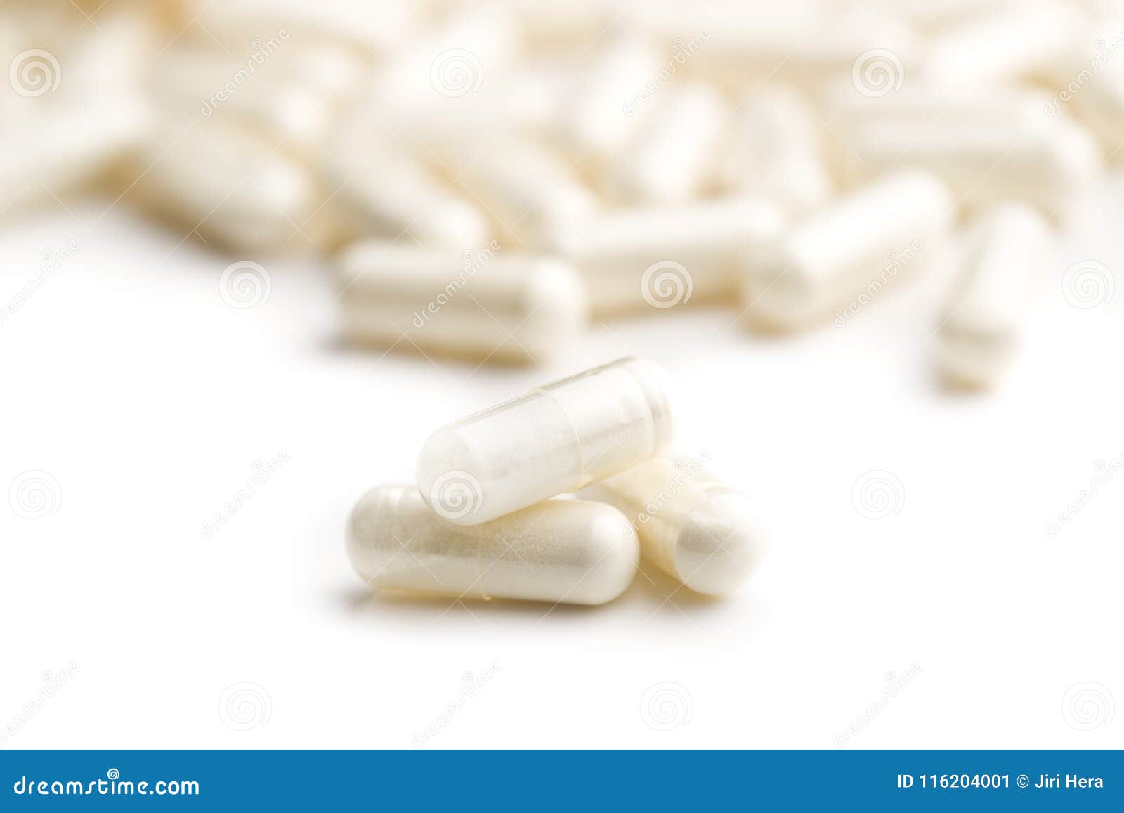 white medicine capsules.