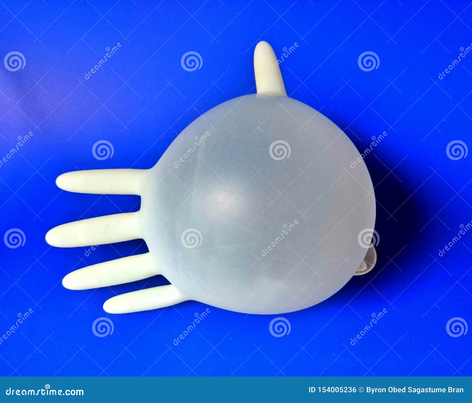 white-medicine-latex-glove-inflated-blue-background-inflated-white-latex-glove-blue-background-154005236.jpg