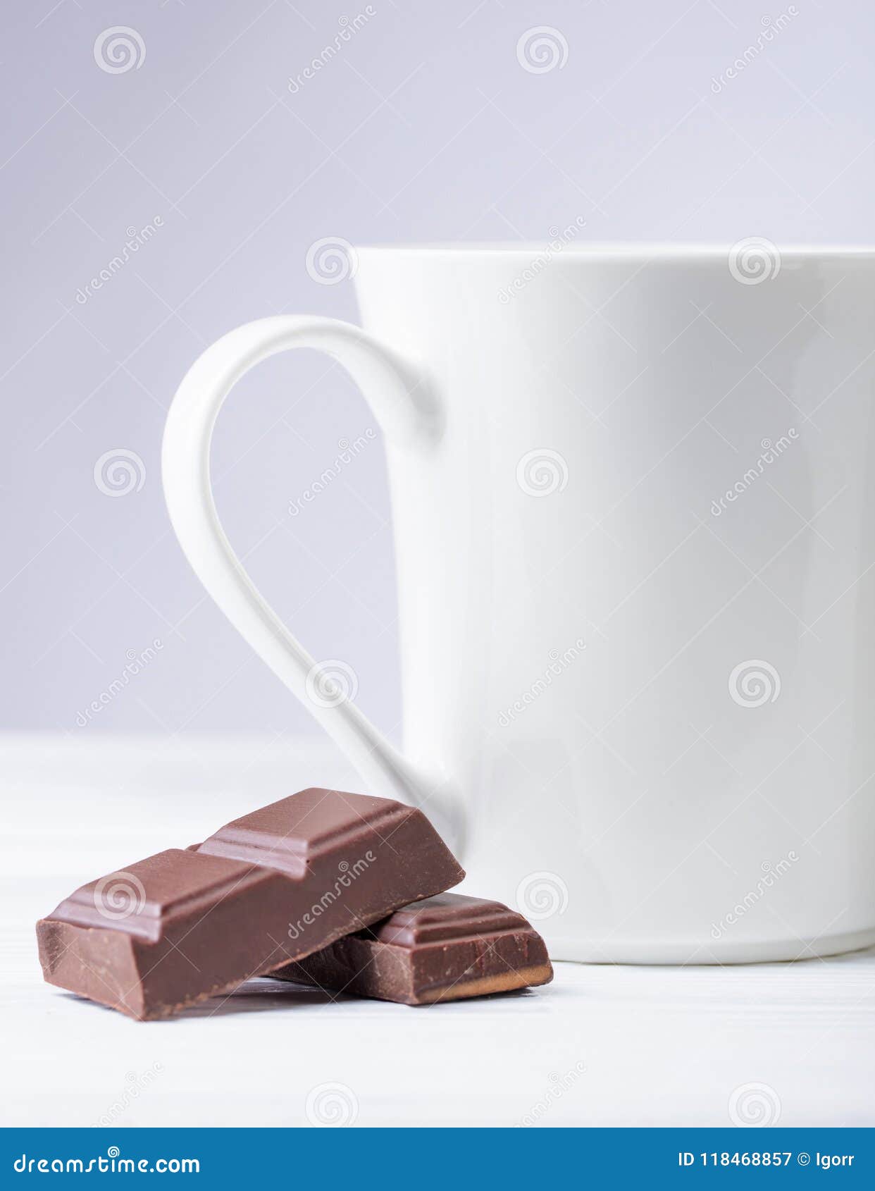 White Mug of Hot Drink and Bitter Chocolate Pieces. Stock Image Image