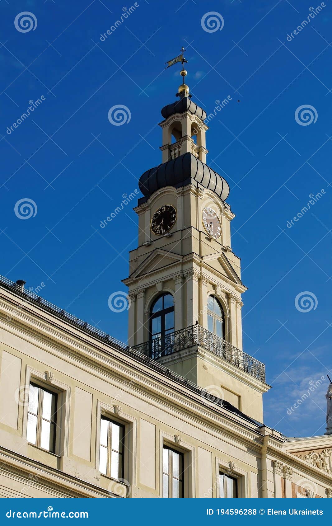 white old clock tower in the gothic style, riga.