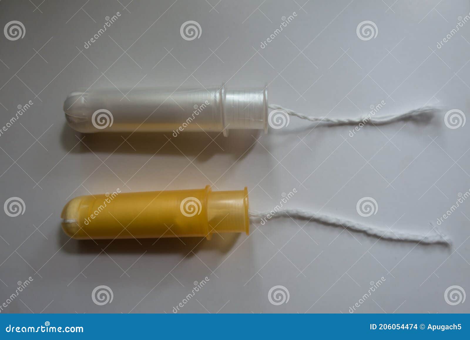 White and Orange Tampons with Plastic Applicators Stock Photo Image of intimate, health 206054474