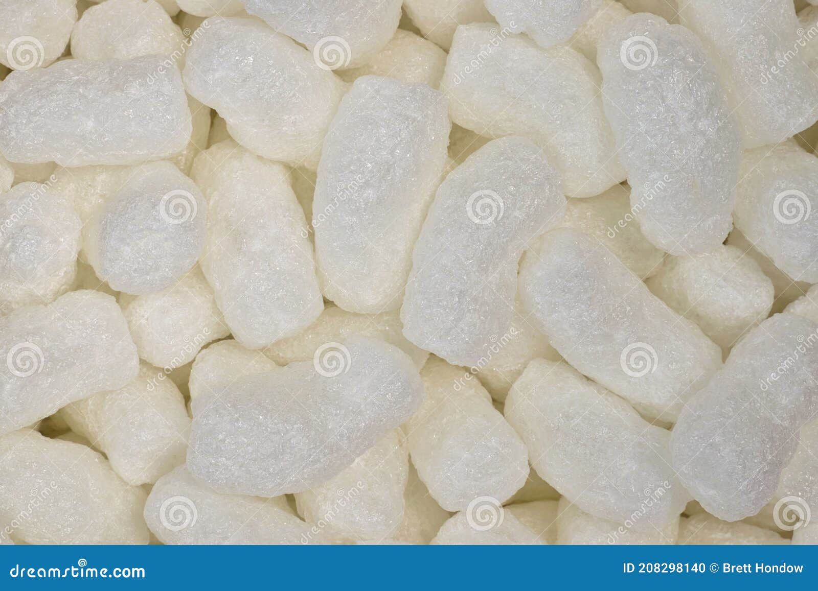 White Packing Peanuts Styrofoam Popcorn Packaging Material. Stock Photo