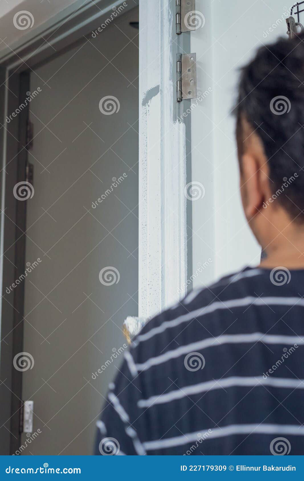 White Paint on the Door Frame. Painting Project, DIY at Home Stock