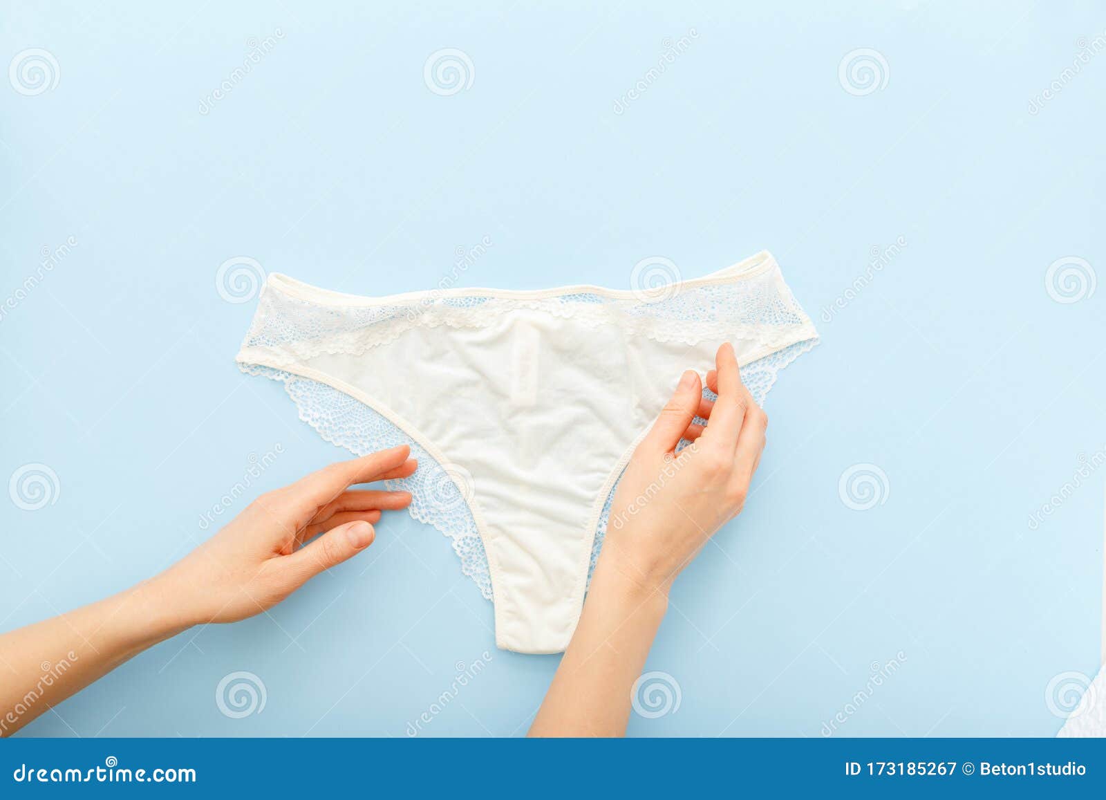 White Pantie in Female Hands. Woman Choosing Holding White Pantie ...