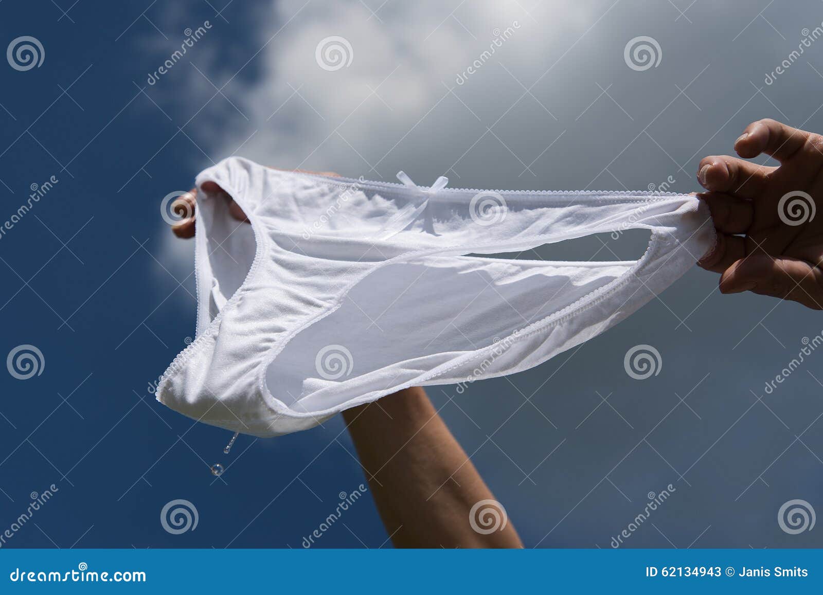Wet underwear against blue sky. 